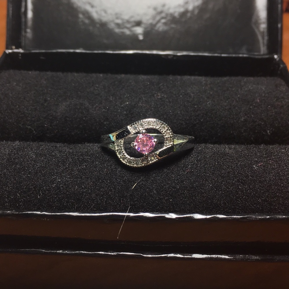 Silver and pink ring